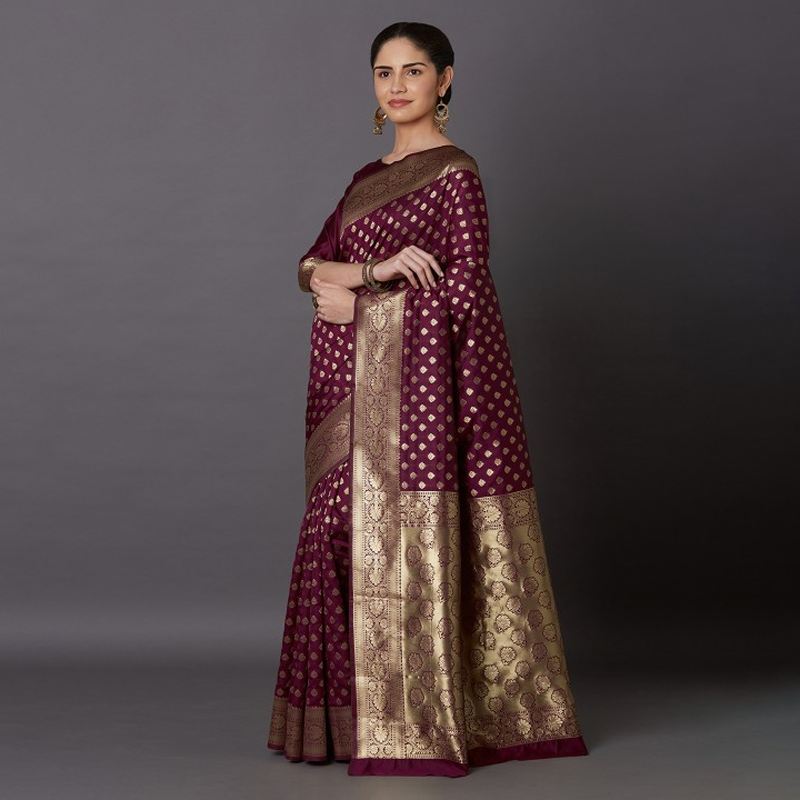 Magenta Gold Toned Silk Blend Woven Design Kanjeevaram Saree Magenta Gold Toned Silk Blend Woven Design Kanjeevaram Saree
